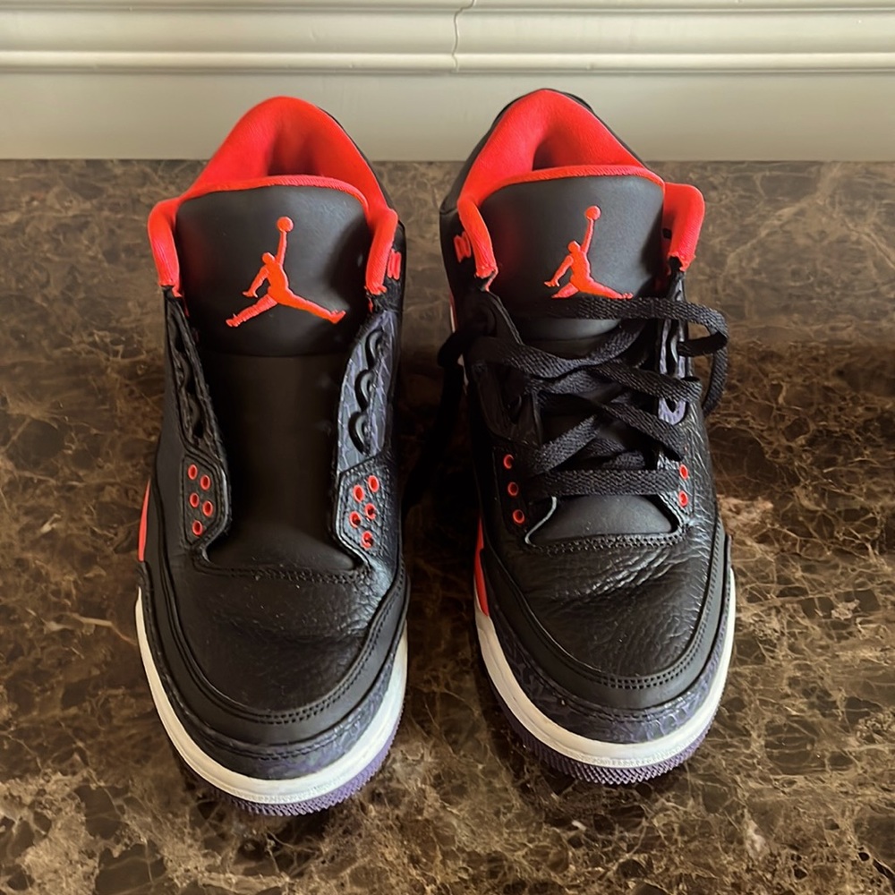 Black and red Nike Jordans